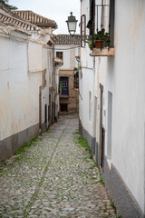 Fototapeta na wymiar Walking in old central part of world heritage city Granada, Andalusia, Spain