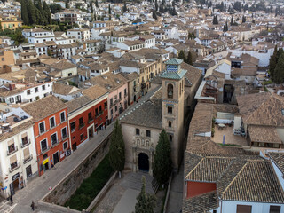 Fototapeta premium Aerial panoramic view on buildings, old district, mountains and palace, world heritage city Granada, Andalusia, Spain
