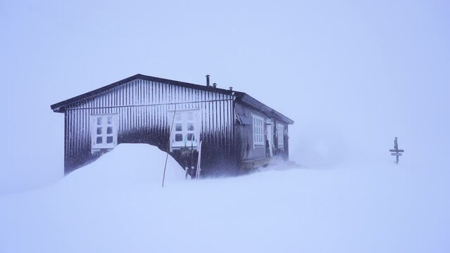 A mountain hut in  a severe snow storm (whiteout) in Swedish Lapland during winter.