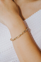diamond bracelets on the girl's wrist with well-groomed white nail polish. jewelry models for...