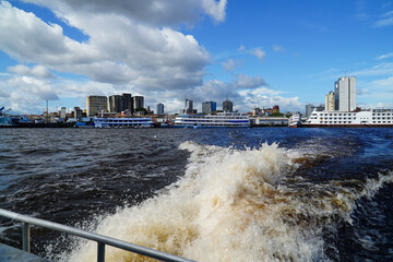 Panorama city view of the Amazon metropolis Manaus in Brazil. View from Rio Negro river northward...