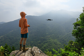 Drone flying in spring forest