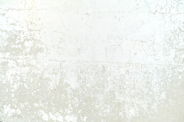 Fototapeta premium Renovation needed wall with falling apart white paint