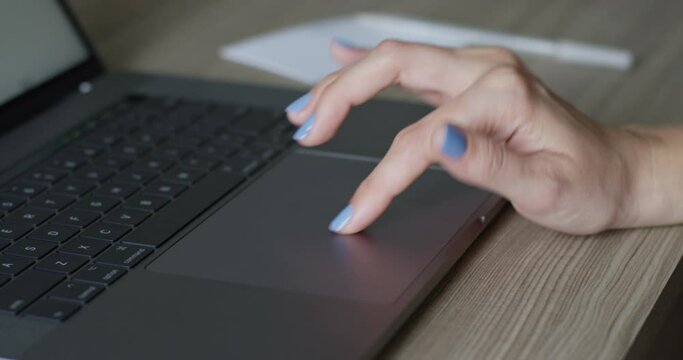 Woman Working On Laptop Touchpad