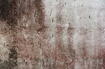 Old painted wall texture with different color gradations close-up background
