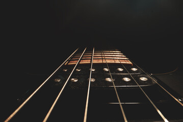 Close-up view of Six-string electric guitar pickup. - obrazy, fototapety, plakaty