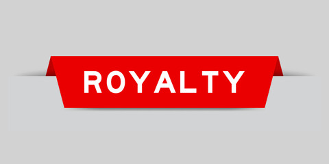 Red color inserted label with word royalty on gray background