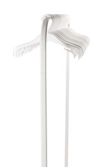 White plastic hangers for clothes hanging on rod from clothing rack. Isolated on white background..