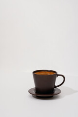 A cup of coffee on the table. .