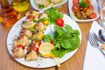 chicken grill served on wooden board