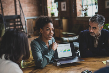 African American businesswoman presenting to clients
