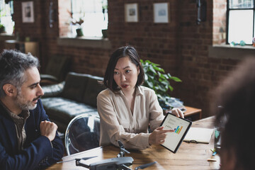 Business presentation in a modern co working office space
