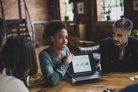 African American businesswoman presenting to clients