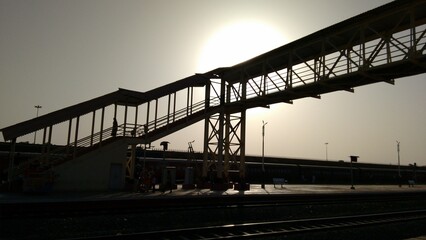 Naklejka na ściany i meble railway bridge at sunset