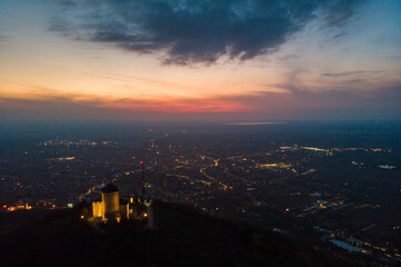 Fortress over the town of Vr&scaron;ac and the sunset. Aerial photography.