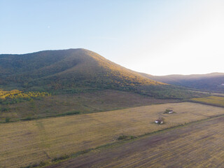 Two houses under the hill