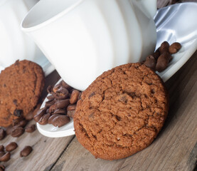 Fresh coffee with biscuits and roasted beans