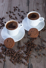 Fresh coffee with biscuits and roasted beans