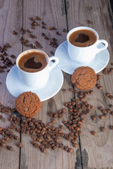 Fresh coffee with biscuits and roasted beans