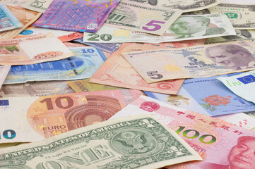 Fototapeta na wymiar World paper money as financial background. Global currency banknotes. Paper money in cash