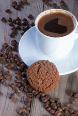 Fresh coffee with biscuits and roasted beans