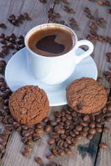 Fresh coffee with biscuits and roasted beans