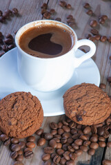Fresh coffee with biscuits and roasted beans