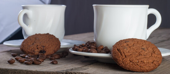 Fresh coffee with biscuits and roasted beans