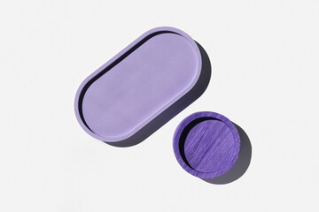 Podium for cosmetic product presentation. Abstract minimal geometrical form on white background. Oval stone form, shadow. Scene, Showcase, display. Minimal design. Trendy sunlight. Flat lay, Top View