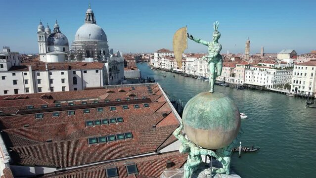 Italy, Veneto, Venice, Aerial view of Dogana da Mar, movable wind vane of the goddess Fortuna on a gilded globe, carried by atlases
