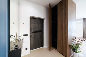 Modern interior design of the house. Corridor in loft style with wood