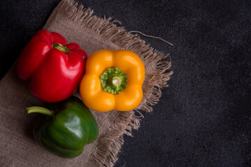 Fresh bell peppers of different colors, healthy vegetable vitamins
