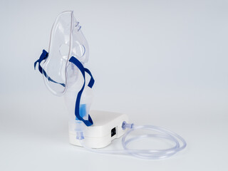 Medical equipment for inhalation with respiratory mask, nebulizer on a white background....