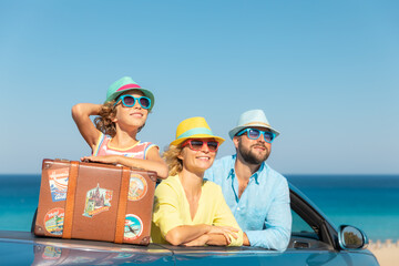 Happy family travel by car on summer vacation