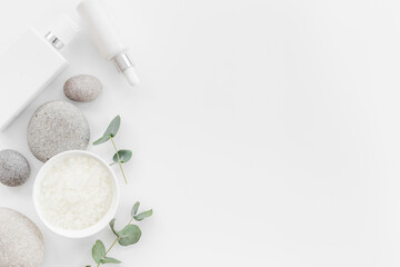 Beauty product mockup - white cosmetic products, top view