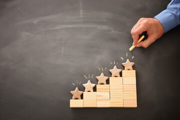 concept image of setting a five star goal. increase rating or ranking, evaluation and...