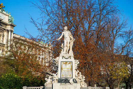 Marble Memorial to the famous compositor and musician Wolfgang Amadeus Mozart on a sunny day in Burggarten garden in Vienna, Austria
