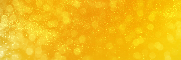 Bright yellow sparkling glitter bokeh background, banner texture. Abstract defocused lights header....