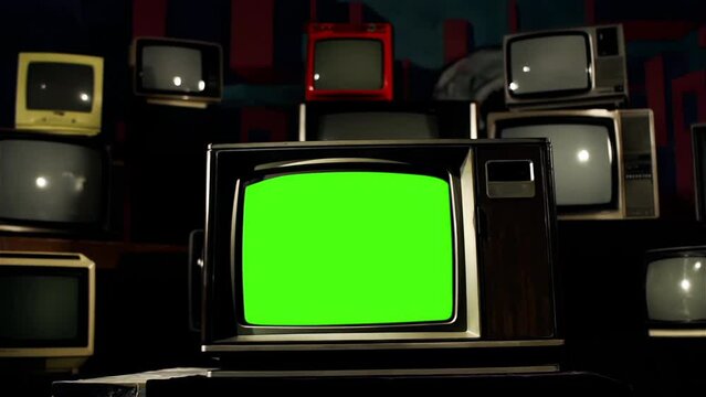 Stacked Vintage Television Green Screen. Dolly In. You can replace green screen with the footage or picture you want. You can do it with “Keying” effect in After Effects. 4K.