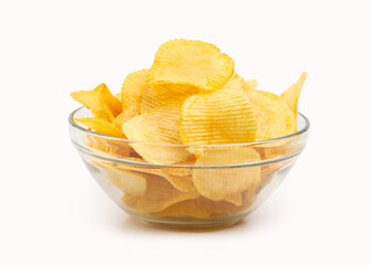 Potato chips in glass bowl isolated on white background