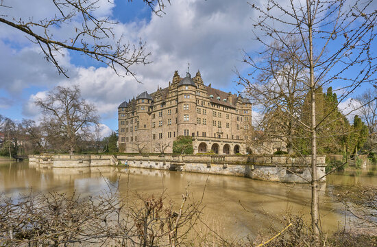 downtown of Neuenstein am Kocher, with its famous Renaissance Residence water castle, Baden-Wuerttemberg. Germany