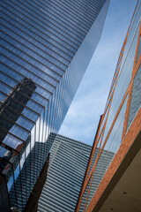 The reflection of a building in another building