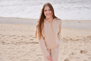 young girl happy on the beach ocean