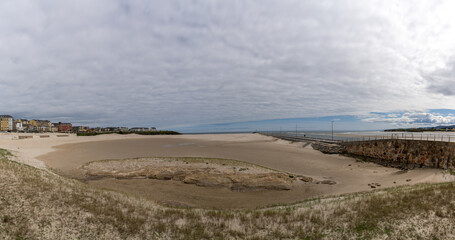 panorama view of Foz beach and town at low tide