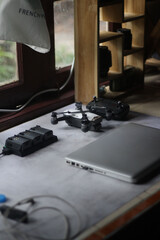 Modern drone and laptop on the table