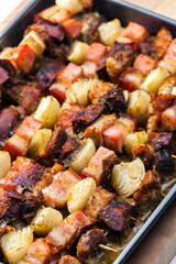 skewers with poultry meat, bacon and onion