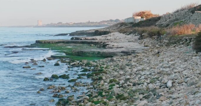 Coast and pebble beach of Molfetta, near Bari. Italy