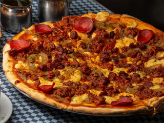 pizza with salami and mexican sausage