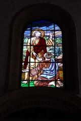 Guimar, Tenerife, Canary Islands, Spain, March 8, 2022: Stained glass window with a biblical image inside the church of Sant Peter in Guimar, Tenerife. Spain