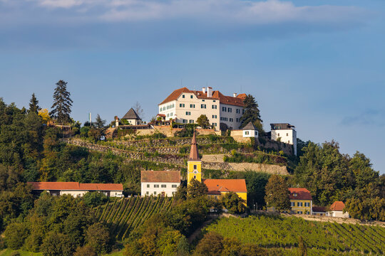 Kapfenstein castle and church with vineyard, Styria, Austria